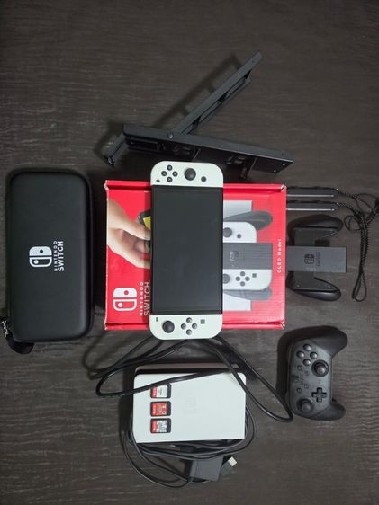 Nintendo Switch OLED + Extra Wireless Controller + 3 Games + Carrying Case