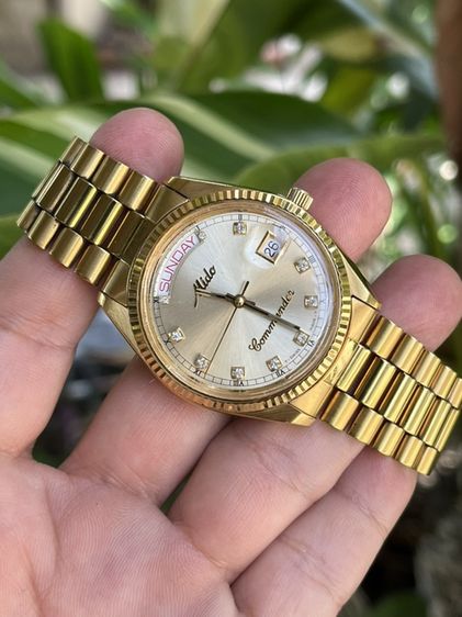 Mido Commander Automatic Swiss Madeเรือนสแตนเลสสึทองขอบทองหยักทรงโรเล็กซ์ หลักพลอย มีวันที่ สัปดาห์ สภาพสวย ขนาดตัวเรือน 37mm. เม็ดมะยมเขันกลียว รุ่น8299