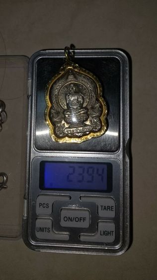 พระ หลวงพ่อรวย รวยพันล้านปี2555 เลี่ยมกรอบทองคำ