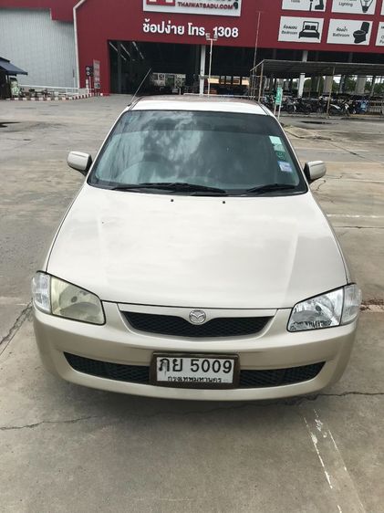 รถ Mazda 323 1.6 SGLX สี บรอนซ์เงิน