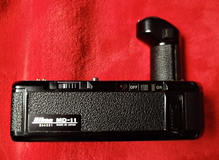 อื่นๆ Nikon MD-11 เป็นอุปกรณ์มอเตอร์ไดร์ฟสำหรับกล้องฟิล์ม Nikon. มือสอง นำเข้าจากญี่ปุ่น