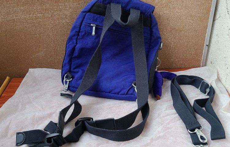💜 [มือสองสภาพสวย] Kipling Firefly 3-in-1 Backpack - สีม่วงเข้ม 💜(​ปรับเปลี่ยนทรงได้ 3 แบบ (เป้สะพายหลัง/สะพายข้าง/ถือ)+พวงกุญแจลิงสีม่วง รูปที่ 3
