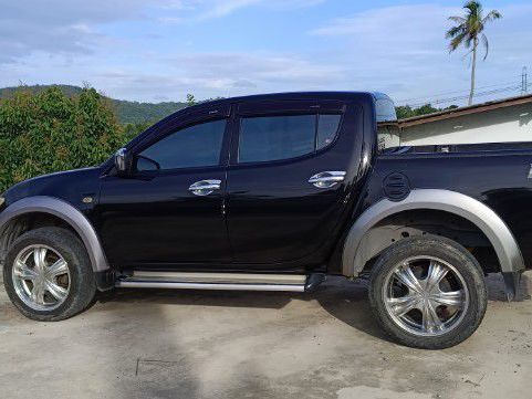 Mitsubishi Triton 2011 2.4 GLS Plus Pickup ดีเซล เกียร์ธรรมดา ดำ
