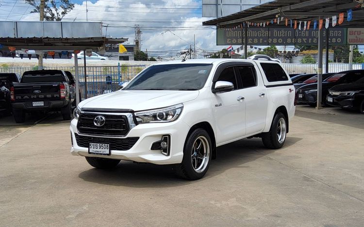รถ Toyota Hilux Revo Double Cab 2.4 Mid Z Edition สี ขาว