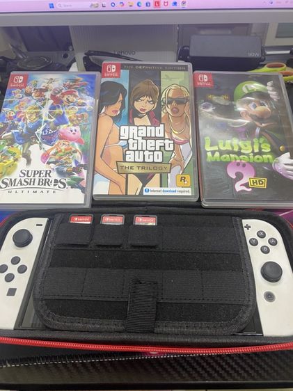 Nintendo OLED พร้อม3เกมดังดับเคส (ไม่ลดราคา)