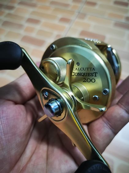 ขายรอกตกปลา ชิมาโน Shimano conquest 200  หมุนขวา สภาพดี มีรอยใช้งานตามสภาพ  รูปที่ 6