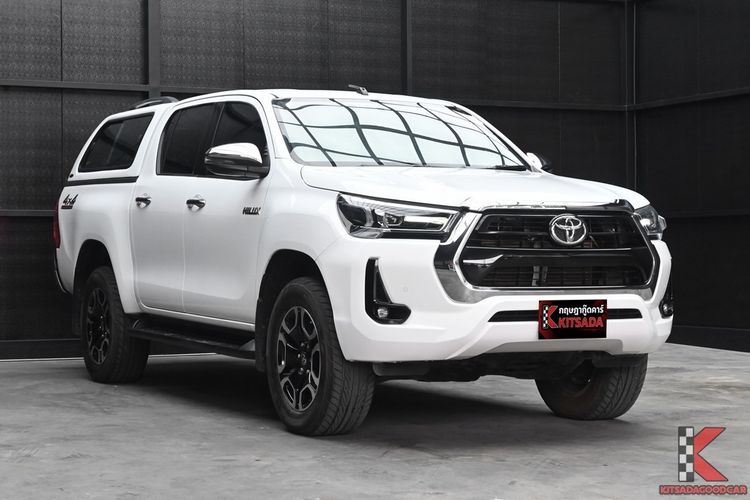 รถ Toyota Hilux Revo Double Cab 2.4 Mid 4WD สี ขาว