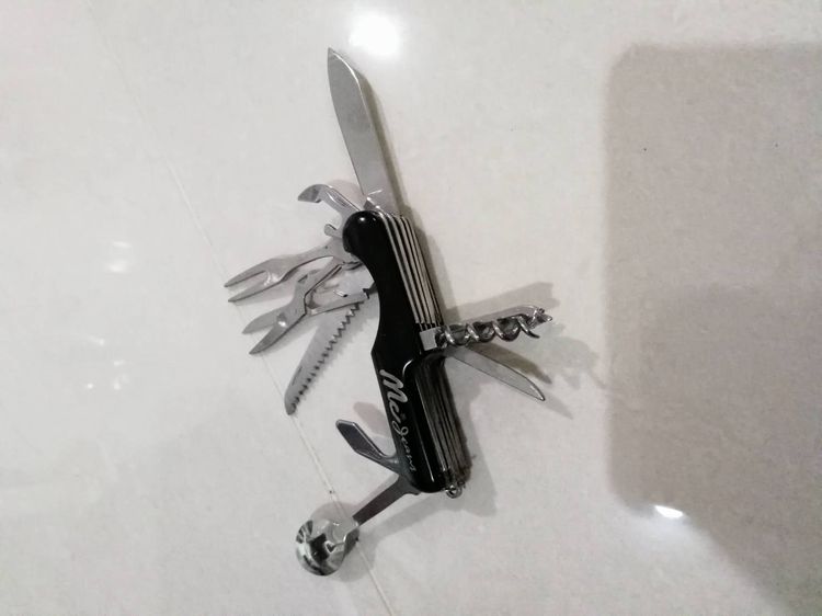 ขาย มีดพกอเนกประสงค์ 11 ใน 1 (11-in-1 Multi-Tool) ด้ามจับสีดำที่สกรีนโลโก้แบรนด์ McJeans รูปที่ 8