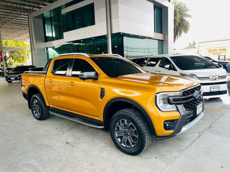Ford Ranger 2024 2.0 Bi-Turbo Hi-Rider Wildtrak Pickup ดีเซล ไม่ติดแก๊ส เกียร์อัตโนมัติ เหลือง รูปที่ 2
