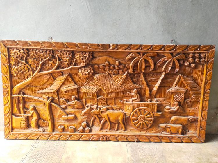 ของตกแต่งบ้านอื่นๆ ภาพไม้สักแกะสลักนูนสูง ลายวิถีชีวิตชนบท ขนาด 100 x 50 ซม.
