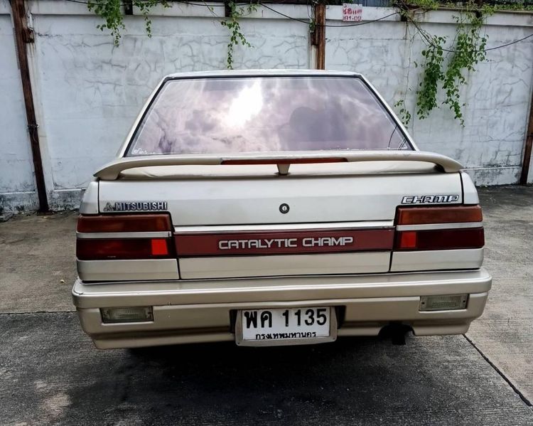 รถ Mitsubishi Lancer 1.3 GL สี บรอนซ์ทอง