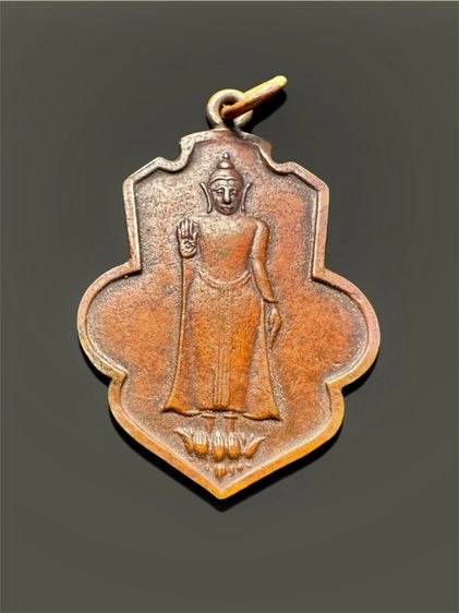 เหรียญหล่อโบราณ หลวงพ่อธรรมจักร วัดธรรมามูลวรวิหาร (วัดเขาธรรมมามูล) จังหวัดชัยนาท พิมพ์น้ำเต้า เนื้อทองแดง ปี พ.ศ. 2461 