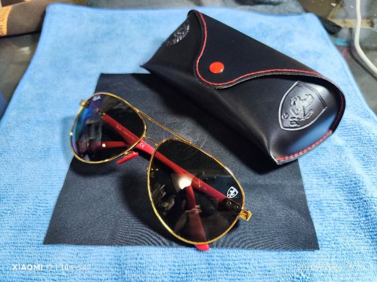 แว่น RayBan (คอลเลกชั่นพิเศษ Scuderia Ferrari) รุ่นRB8313-M(รหัสสีF008/71) เป็นแว่นทรงนักบิน(Aviator)